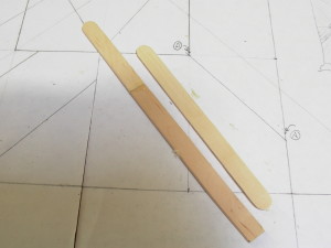 Extending the Popsicle sticks.